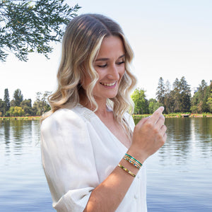 Manchette multirangs vert lagon et dorée en acier inoxydable pour femme